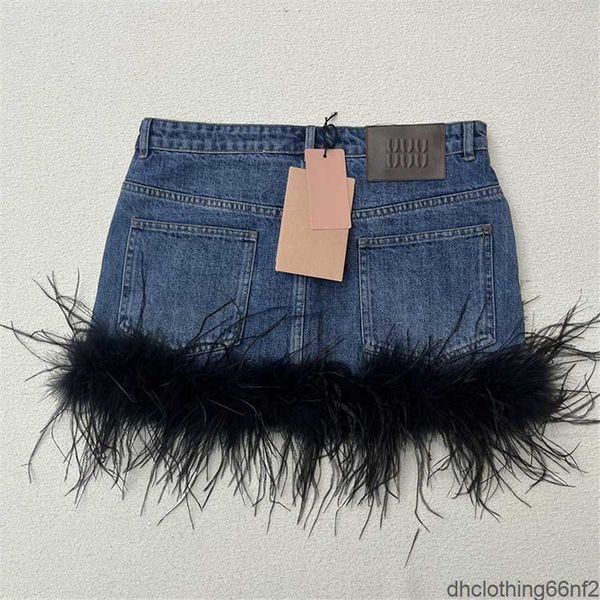 Diseñador de campos de pelaje de plumas Falda de mezclilla Mini faldas azules Vestidos Sexy Luxury Jean Pa3s