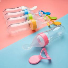 Feeding Squeezing Feeding Bottle Silicone Newborn Baby Training Rice Cereal Food Spoon Supplement Feeder Safe Useful Tableware for Kids