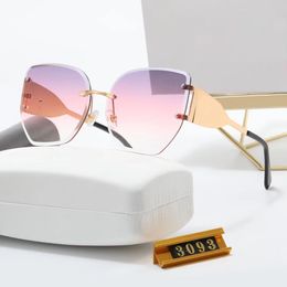 Vrouwelijke designer merk zonnebrillen randloze zonnebril kattenooglenzen metaal gepolijste tempels vlindervleugeltype zonnebrillen roze lenzen UV -bescherming