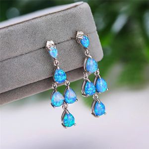 Femme luxe blanc bleu opale boucles d'oreilles charme goutte d'eau pierre longue gland boucles d'oreilles pour les femmes de mariage couleur argent boucle d'oreille pendante 240122