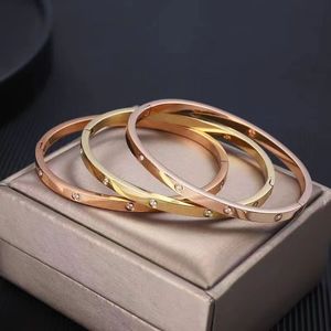 Femmes schroef armband nieuwe mode high polijst goud merk designer sieraden roestvrijstalen eeuwige breedbandmanchet armband