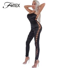 FHTEX Dames Sexy Low Cut Spaghetti Strap Lace Up Hollow Out Club Party Jumpsuit Rompertjes 2017 Backless Satijn Slanke Casual Catsuit Y19051501