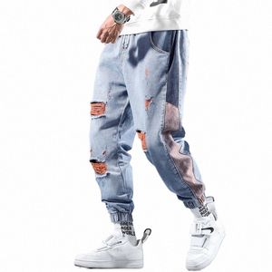 Fi Mens Loose Jean Harem Ripped Jeans Lâche Unique Hip Hop Vêtements Qualité Outwear Pantalon en denim à revers pour homme 42nA #