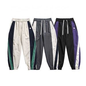 Pantalon de piste en polyester de vêtements Finch Colorblock Patchwork Pantalon de survêtement en nylon pantalon pour hommes