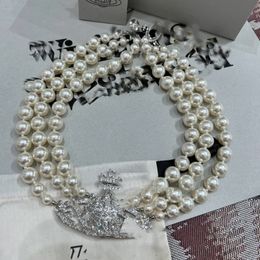 Fina artesanía y versión de alta calidad del clásico banquete de lujo de lujo de tres capas Chokers de perlas de anillo de Saturno
