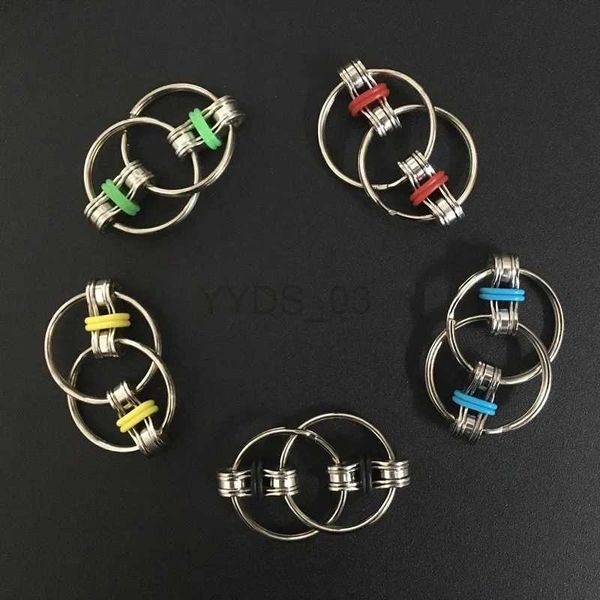 Juguetes para los dedos 5 colores Creative Fidget Bike Chain Toy para autismo Estrés Manos Niños divertidos 1pc Anillos yq240227