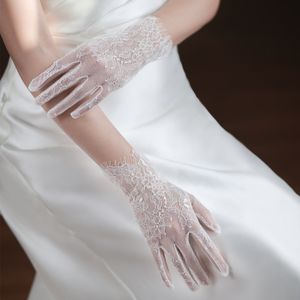 Fingerless Gloves WG062 Exquise bruiloft Bridal Short White Tule Lace Finger Pols Brides Bruidsmeisje handschoen Huwelijkaccessoires 230504