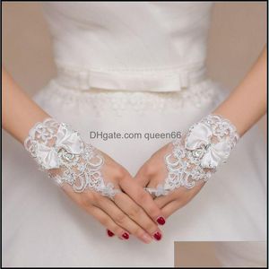 Guantes de cinco dedos Novia Pajarita corta Elástico Encaje blanco Diamante Danza femenina Rendimiento Mujeres Etiqueta sin dedos Guante Gota De Otzdz