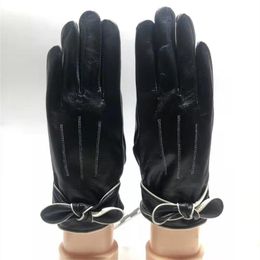 Cinq doigts gants en cuir véritable mode femmes dames papillon arc poignet doux automne hiver thermique en peau de mouton marque de haute qualité