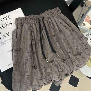 Vijfpunt gescheurde shorts voor heren zomer hiphop hiphop losse casual broek Amerikaanse stijl schurken en knappe merk strand shorts