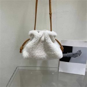 Sac Flamencos Loewwes épaule en cuir véritable 7a Baobao femme et Simple petite bénédiction bandoulière en peau de vache cordon petit