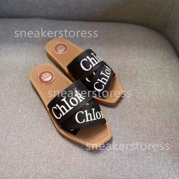 Chica plana Sandalia Chlooe Woody Sandalias rojas Zapatilla Diseñador 2024 Letra Ropa de verano femenina Nueva Cruz casual Fondo grueso 5bhj