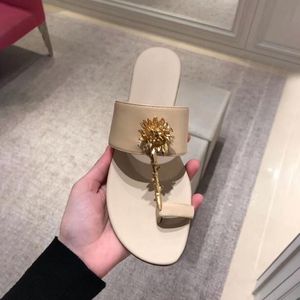 Slippers platte hiel metalen bloem buitenshuis open tenen zachte zool sandalen zwart besteed je vakantie slippers dames schoenen