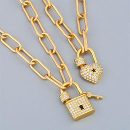 FLOLA or longue chaîne clé cadenas collier pour femmes cristal coeur serrure pendentif cubique zircone Punk bijoux Couple cadeaux nker60253G