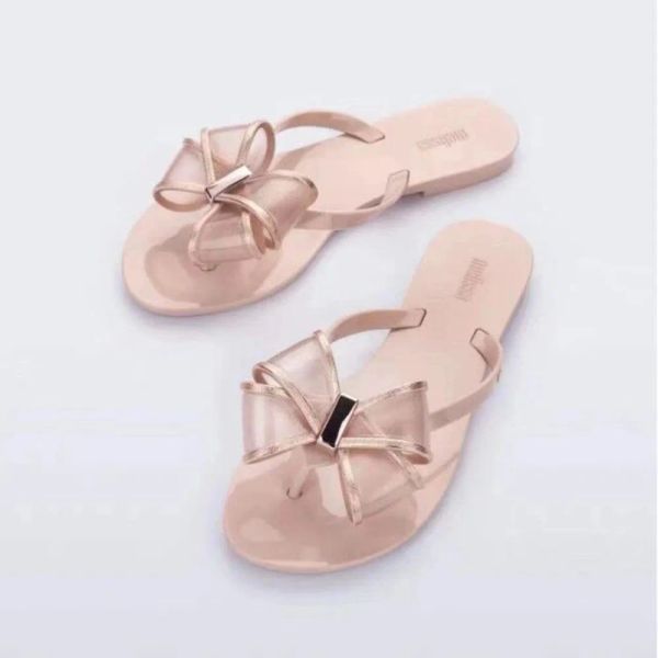 FLOPS NUEVA LLEGA Mujeres Bow Flipflop Melissa Siguiente estilo Ladies Jelly Shoes Fashion PVC Brasil Beach Wear Sandals Sm103 SM105