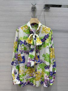 Camisas con estampado floral Cuello alto Streamer Bow Adornado Camisa de manga larga Tela micro transparente Moda Adelgazante Tops sexy Blusas de mujer