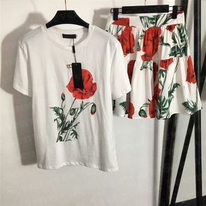 T-shirt en coton imprimé de fleurs, ensembles de robes plissées pour femmes, pull de Style styliste, jupes courtes Sexy pour dames