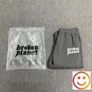 Schuimprint gebroken planeet track broek mannen vrouwen hoge kwaliteit katoenen kleding streetwear casual jogger broek zweetwedstrijden 240425