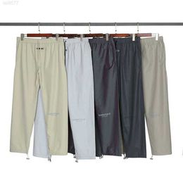 Fog Essentials Pantalones de nailon coloridos reflectantes con láser Pantalones casuales de calle principalatdh