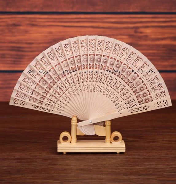 Vouwen Houten Gesneden Ambachtelijke Hand Fans Chinese Klassieke Houten Fan Voor Huisdecoratie Ambachten Souvenir Geschenken trouwbedankjes2875312