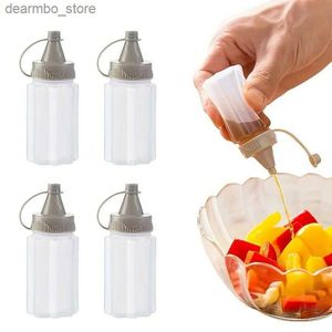 Pottes de nourriture Canisters 4pcs Sauce bouteille compressée mini-bouteilles ketchup bouteilles de salade de salade contenants extérieurs barbecue portable jar groupe de cuisine outils l49