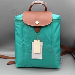 Pour les femmes de vente au détail en gros à 95% sacs d'arrêt de fourre-tout de concepteur Vente de bourse noir sac à dos brodé Sac d'ordinateur étudiant pliable voyage maman 8mtap