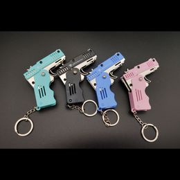 Voor speelgoed zachte kogels van 8-55 jaar, kan het M1 Mini Pendant Folding Rubber Band Gun met sleutelchains legering plastic worden gebruikt