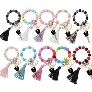 Commerce extérieur nouveau créatif Silicone entretoise perlé Bracelet porte-clés en cuir PU gland pendentif porte-clés en gros