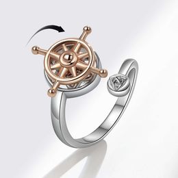 Fortune est livré avec un anneau rotatif de gouvernail de navire à double couche personnalisé et à la mode pour hommes et femmes