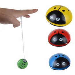 Vier kleuren lieveheersbeestje yo bal blauw groen rood geel lieveheersbeestje yoyo creatief speelgoed houten yo speelgoed voor kinderen 5.5 * 5.5cm G1125