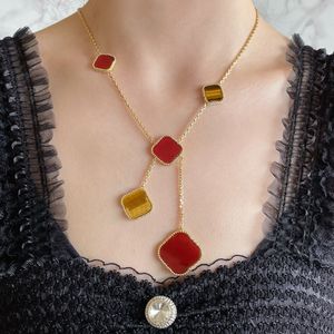 Collier trèfle à quatre feuilles chaîne de pull ensemble de bijoux de créateur chaîne à maillons collier de trèfle or argent nacre vert fleur rouge colliers de charme femmes