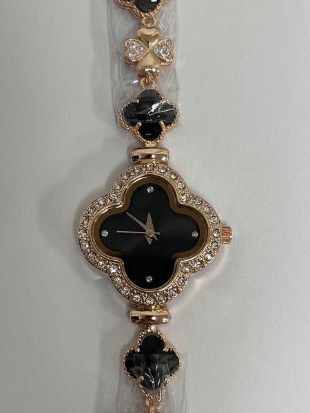 Montre à quartz pour femme trèfle à quatre feuilles, une montre classique, luxueuse, élégante et exquise