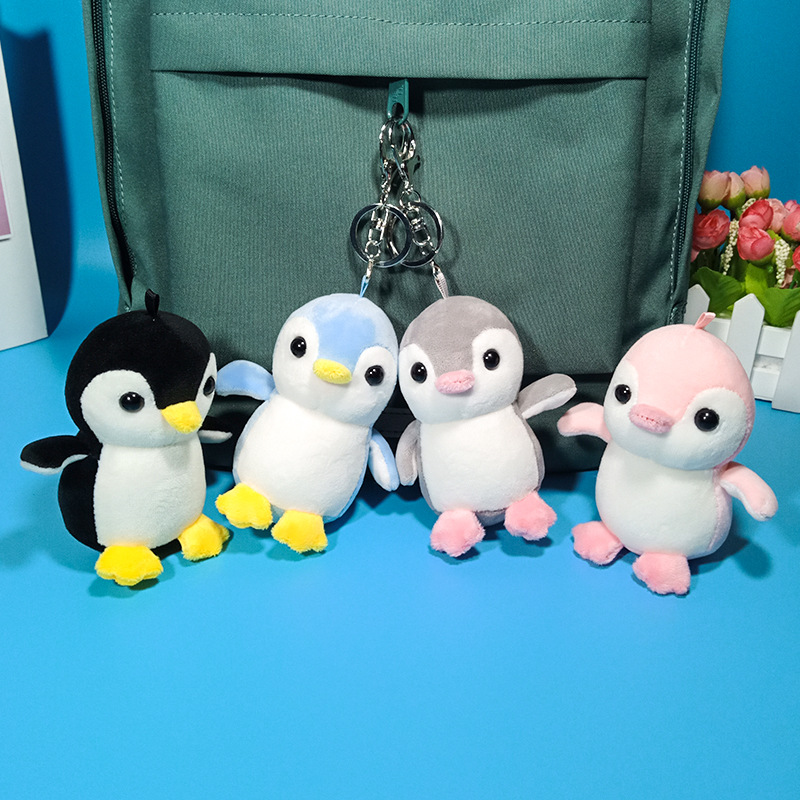 Four sided bouncing penguin doll backpack pendant ins internet celebrity cute car keychain female plush grab machine doll