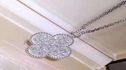 Chaîne de pull de trèfle à quatre feuilles femmes039s S925 diamant microincrusté long collier pendentif fleur accessoires Luxurys Designer9347348