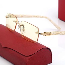 Frameloze zonnebril voor vrouwen Fashion Men Designer Zonnebril Vrouw Transparante lensglazen Amerikaanse brillen ins net rood dezelfde Dhgate zonnebril met doos