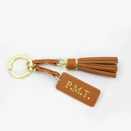 Gratis aangepaste lederen sleutelhanger designer tassel mode auto luxe unisex sleutelhanger tas portemonnee