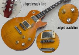 Kous! Elektrische gitaar Lemon Center Dunne kersen Red Burst Edge Flame Top Speciale functie met die scheurlijn op het hoofd teruggesneden