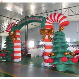 Activités de plein air de bateau libre 10 mW x 5 mH (33x16,5 pieds) Publicité de Noël Ballon de sol gonflable géant pour porte d'arche de Noël à vendre