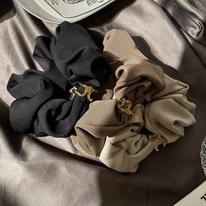 Franse zwarte satijnen rubberen band herfst nieuwe hoge gevoel triomfboog haar touw klassiek ontwerp hoofddeksels charme Womens liefde cadeau Headrope