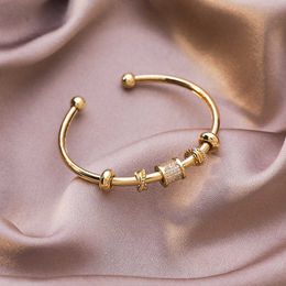 Franse elegante glanzende CZ steen messing goud armbanden voor dames dames geometrische kruis verstelbare open bedelarmband partij sieraden Q0717
