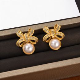 Boucles d'oreilles françaises Medieva pour femmes, bijoux de tempérament Vintage, nœud papillon en or, perle de diamant, bijoux de haute qualité