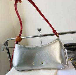 Sacs à main de marque de niche française Jaq Sac à perles Sac à bandoulière unique Designer Hobo Sacs Porte-téléphone Sac à bâton français Sacs de banquet pour femmes