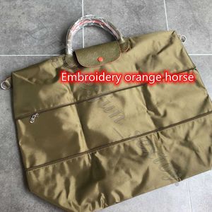 Bolso de hombro francés 95% Bolsas de diseñador de liquidación de equipaje Bolsa Luxury minorista Viajes Luz al por mayor Menores plegables Mujeres Dumplings Universal Dumplings