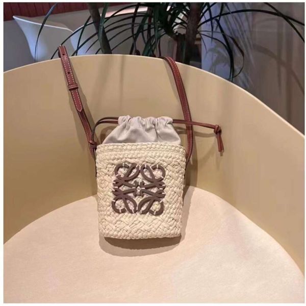 Luo Jia – petit sac seau à eau tissé à la main pour femmes, en paille française tissée, asymétrique épaule dénudée, petit sac d'été, nouvelle collection 2023