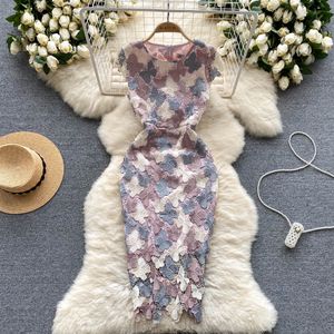 Franse stijl en high-end vlinder uitgehold haak kanten jurk met een slanke taille elegante en elegante beroemde wrap heuprok