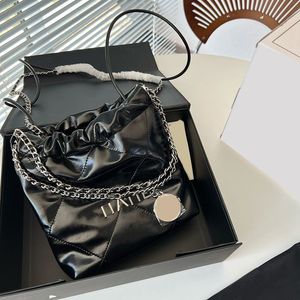 Français Mini DrawString 22 Sac blanc noir avec bracelet rond en cuir réel Silver Metal Hardware Matelasse Crossbody Bodner Sac à main charme 19x21,5 cm