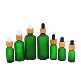 Flacon compte-gouttes en verre givré 10 ml 15 ml 20 ml 30 ml 50 ml avec couvercle en bambou bouteilles d'huile essentielle vert givré Cwfot