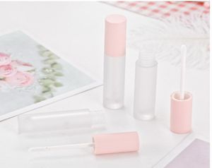 Tubos de brillo de labios con tapa rosa transparente esmerilado Tubo de brillo de labios transparente con tapa rosa Botella recargable de brillo de labios cosmético redondo simple2982351