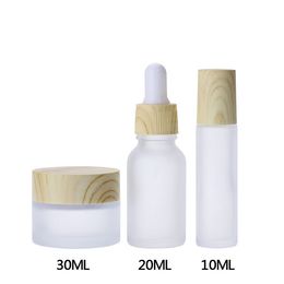 Frosted Glass Cosmetische containers met houtnerf GLB, 30 ml ronde pot, 20 ml oogdruppellers, 10 ml roller flessen voor essentiële olie parfum