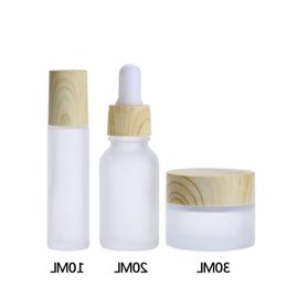 Matglas cosmetische containers met houten korrelkap, 30 ml ronde pot, 20 ml oogdruppeldlessen, 10 ml rolflessen voor etherische olie per klootzak